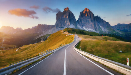 mountain road beautiful asphalt road in the evening incredible summer day vintage toning highway in mountains pass giau dolomites alps italy popular travel and hiking destination - obrazy, fototapety, plakaty