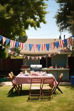 A fun and casual photo of a family BBQ with American flags and bunting decorating the backyard