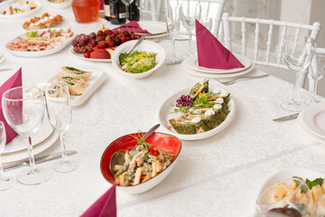 Decoration and serving of the festive table in the restaurant