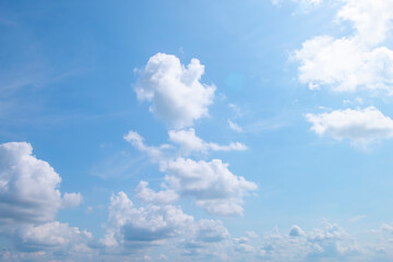 The sky was beautiful, filled with soft white clouds.
