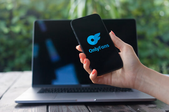 OnlyFans logo, internet content subscription service, displayed on iPhone screen