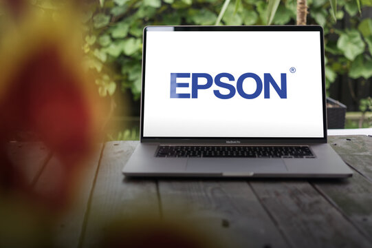 Epson logo, Japanese multinational electronics company, manufacturer of printers and information- and imaging-related equipment, displayed on MacBook Pro screen