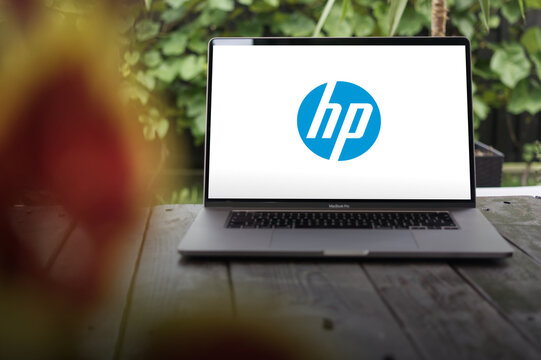 HP logo (Hewlett-Packard), multinational information technology company that sells hardware, software and related business services, displayed on MacBook Pro screen