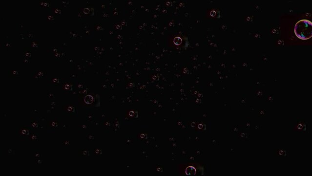 Air Bubbles on a Black Background. Abstract circles and colored bubbles on a dark background. 