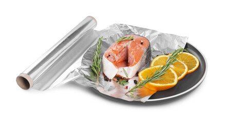 Aluminum foil with raw salmon, orange slices, rosemary and spices isolated on white