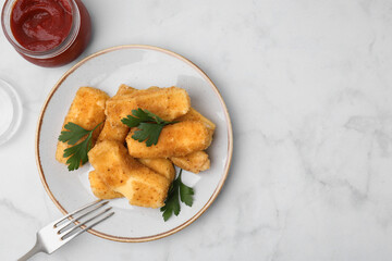 Plate with tasty fried mozzarella sticks and parsley served with ketchup on white marble table, flat lay. Space for text
