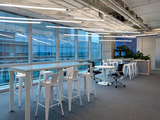 Interior of modern empty office building.Open white ceiling design.