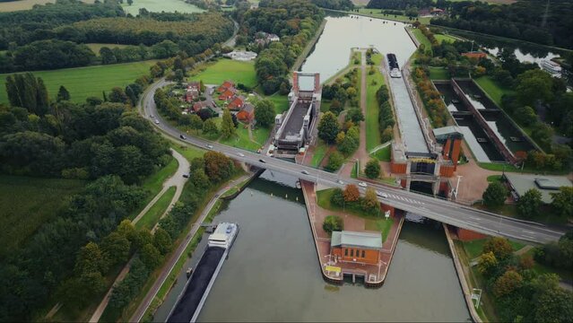 Aerial drone footage of elevator for cargo ships near water canal in Datteln, Germany.
