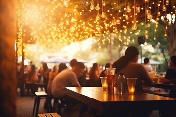 Bokeh background of Street Bar beer restaurant, People sit chill out and hang out dinner and listen to music together in Avenue