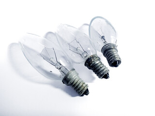 Oval and transparent light bulb isolated on white background