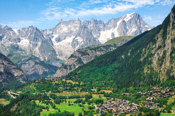 The Grandes Jorasses mountain in the Mont Blanc massif and Palleusieux and Verrand villages. Aosta Valley, Italy