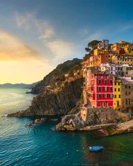 Zelfklevend Fotobehang Riomaggiore fishing village at sunset. Cinque Terre, Italy © stevanzz