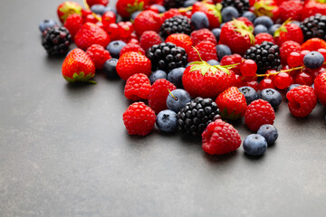 Berries. Various colorful berries Strawberry, Raspberry, Blackberry, Blueberry close-up Bio Fruits, Healthy eating,