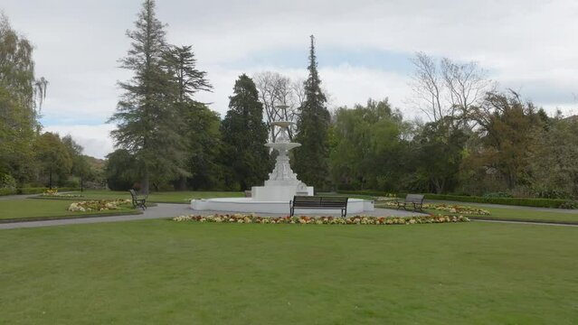 Aerial: flower beds and fountain in the Oamaru Public Gardens in the South Island, New Zealand