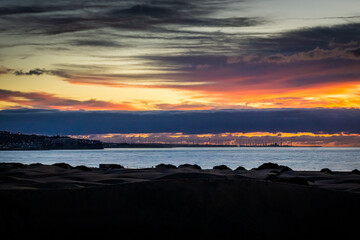 Sunrise over the Atlantic Ocean. Shot from the Dunes of Maspalomas Gran Canaria
