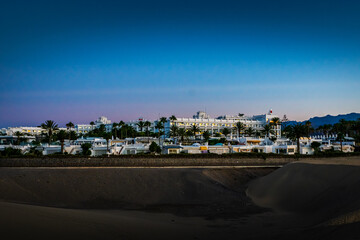 Sunrise over the Atlantic Ocean. Shot from the Dunes of Maspalomas Gran Canaria