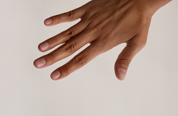 Empty woman hand showing your product.