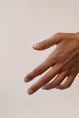 Empty tanned females hand, close up.