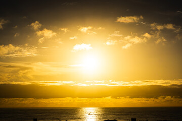 Obraz premium Sunrise over the Atlantic Ocean. Shot from the Dunes of Maspalomas Gran Canaria