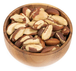 Peeled brazil nut in wooden cup isolated on white background