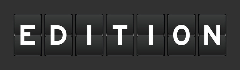 Black color analog flip board with word edition on gray background