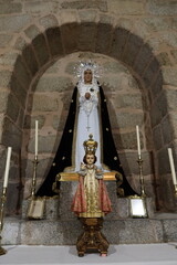 Church of the Assumption, Cadalso de los Vidrios, Madrid, Spain, November 18, 2023: Mother of Jesus and Child inside the Parish Church of the Assumption (16th century)