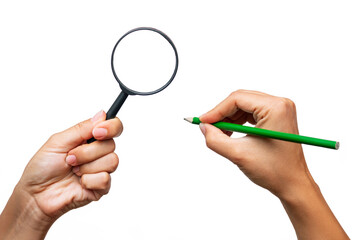 A female hand holding a magnifying glass and a hand holding a pencil isolated on a white...