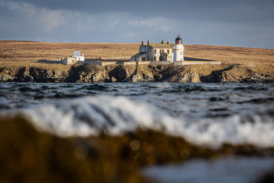 Lighthouse marking the entrance to Kirkwall, Orkney Islands.