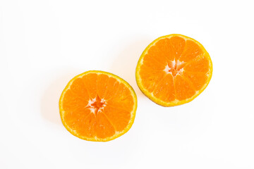 Sliced tangerine isolated on a white background. Top view.