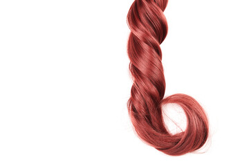 Natural looking shiny hair, bunch of red curls isolated on white background with copy space