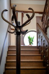 Wooden hanger in the lobby of a two-storey house