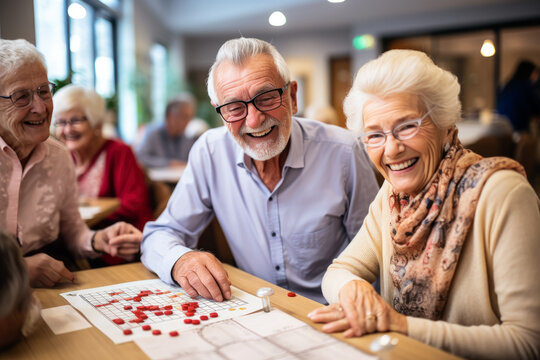 Concentration and enthusiasm of elderly participants as they eagerly mark their bingo cards, hoping for a winning combination