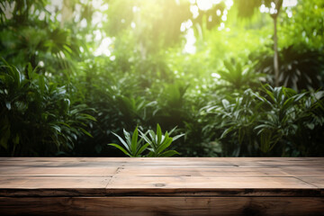 Fototapeta premium blank Wooden counter table in front of greenery plant forest background,organic product mockup