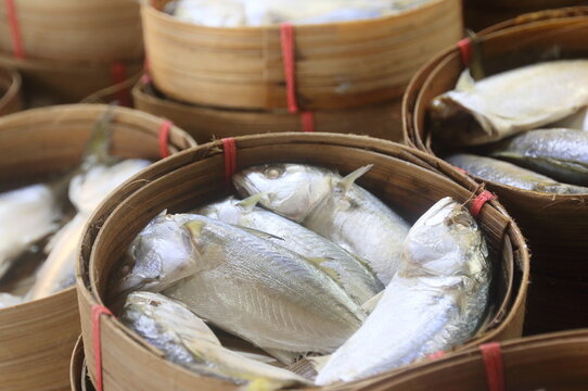 steamed horse mackerel fish in bamboo tray sold in thailand local market, steamed mackerel fish in bamboo tray