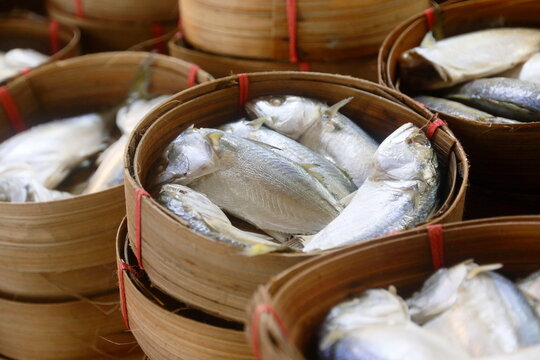 steamed horse mackerel fish in bamboo tray sold in thailand local market, steamed mackerel fish in bamboo tray