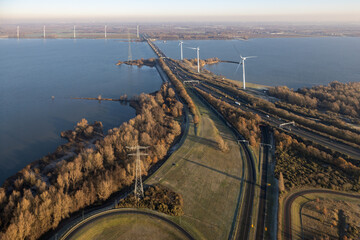 Aerial view at Dutch Haringvliet Bridge with freeway in wintertime