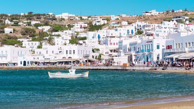 Mikonos, Greece - The Old Town of Mykonos, Chora, with whitewashed cubic houses, bright colors balconies, narrow streets. Inside many restaurants, chic boutiques, shops, lounge clubs