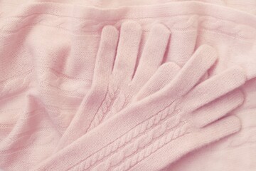 Knitted cashmere texture background. Cashmere scarf and gloves. - obrazy, fototapety, plakaty