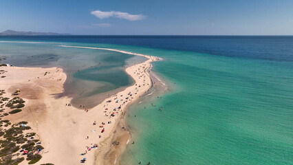 Aerial view of golden sand and crystal sea water on the Canary Island Fuerteventura, Spain. Beach Playa de Sotavento