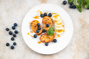 breakfast French toast sweet berries, banana pancake cooking appetizer meal food snack on the table copy space food background rustic top view