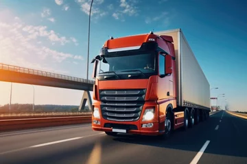 Foto op Canvas A semi truck is seen driving down a highway with a bridge in the background. This image can be used to depict transportation, logistics, or the concept of travel. © Ева Поликарпова