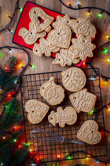 Christmas homemade gingerbread cookies on wooden table