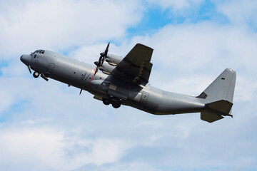 Untitled military transport plane at air base. Airport and airfield. Air force and army flight...