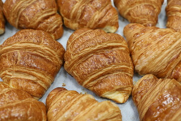 Baking croissants in a small bakery
