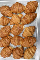 Baking croissants in a small bakery