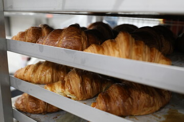 Baking croissants in a small bakery