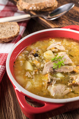 Barley soup with vegetables and chicken.