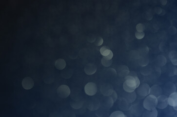 Fondo azul oscuro con luces efecto bokeh ideal para diseño de navidad/fin de año/fiestas. Se...