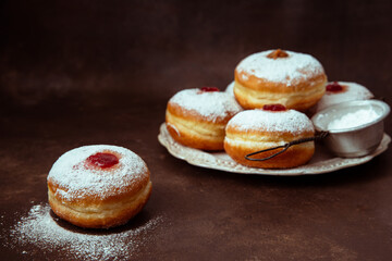 Jewish holiday hannukah symbols - donuts with jam	