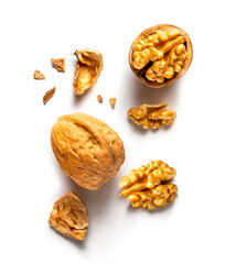 one whole and one open walnut isolated on white background vertical
